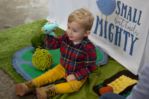 Toddler and blue bird crocheted toy